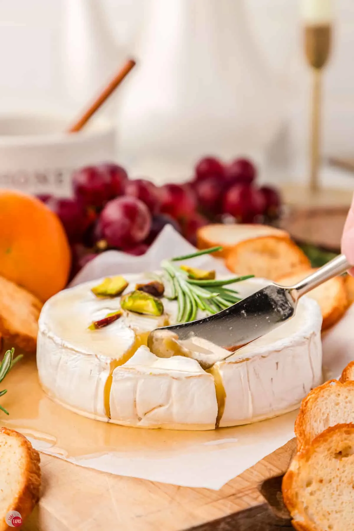 baked brie and honey with cheese knife
