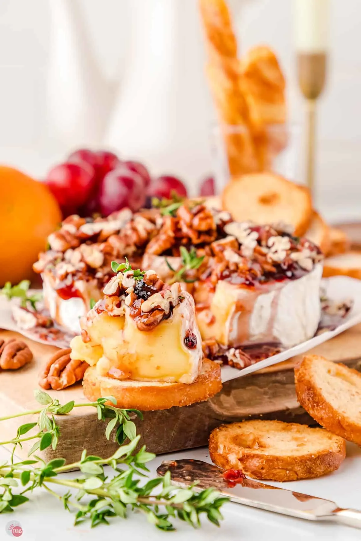 cheesy party appetizer with nuts and raspberry jam