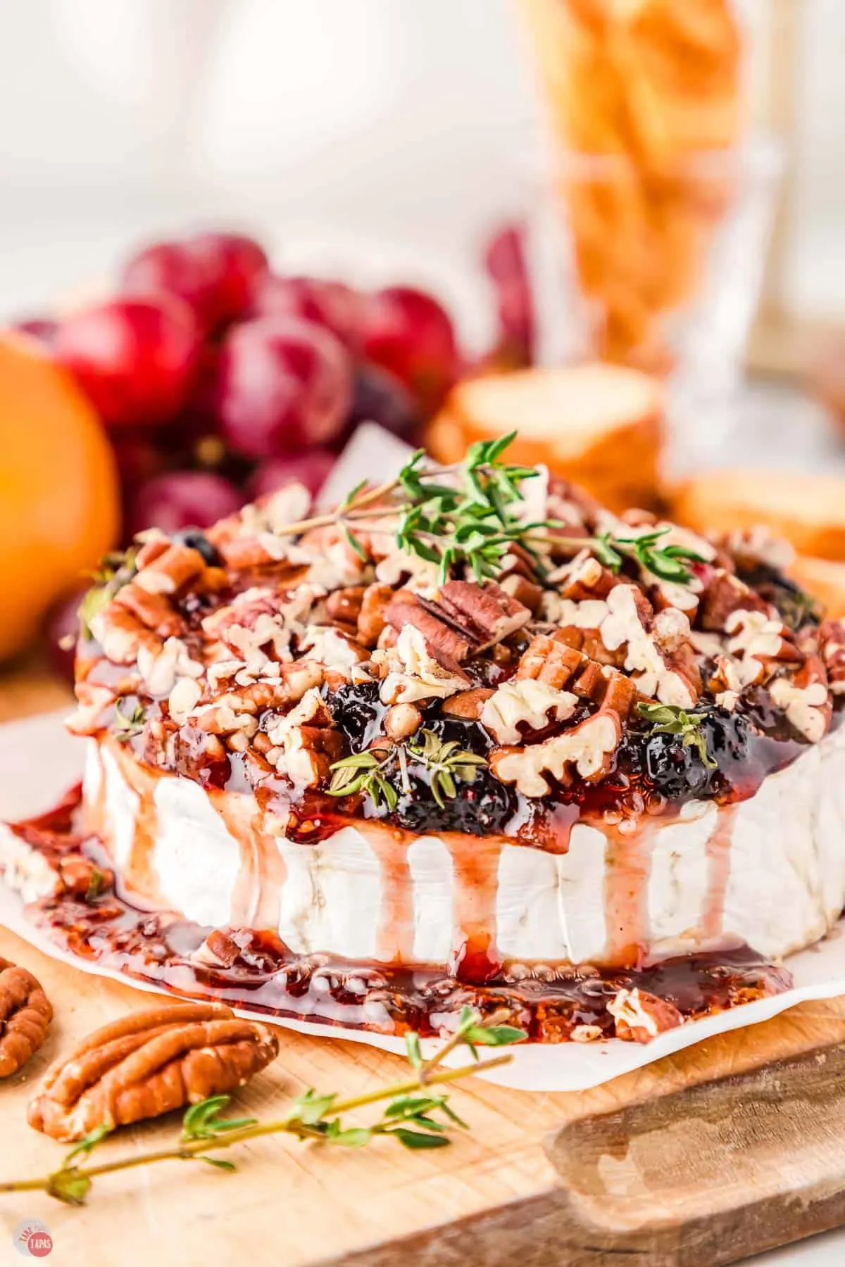 easy appetizer of baked brie with jam and nuts