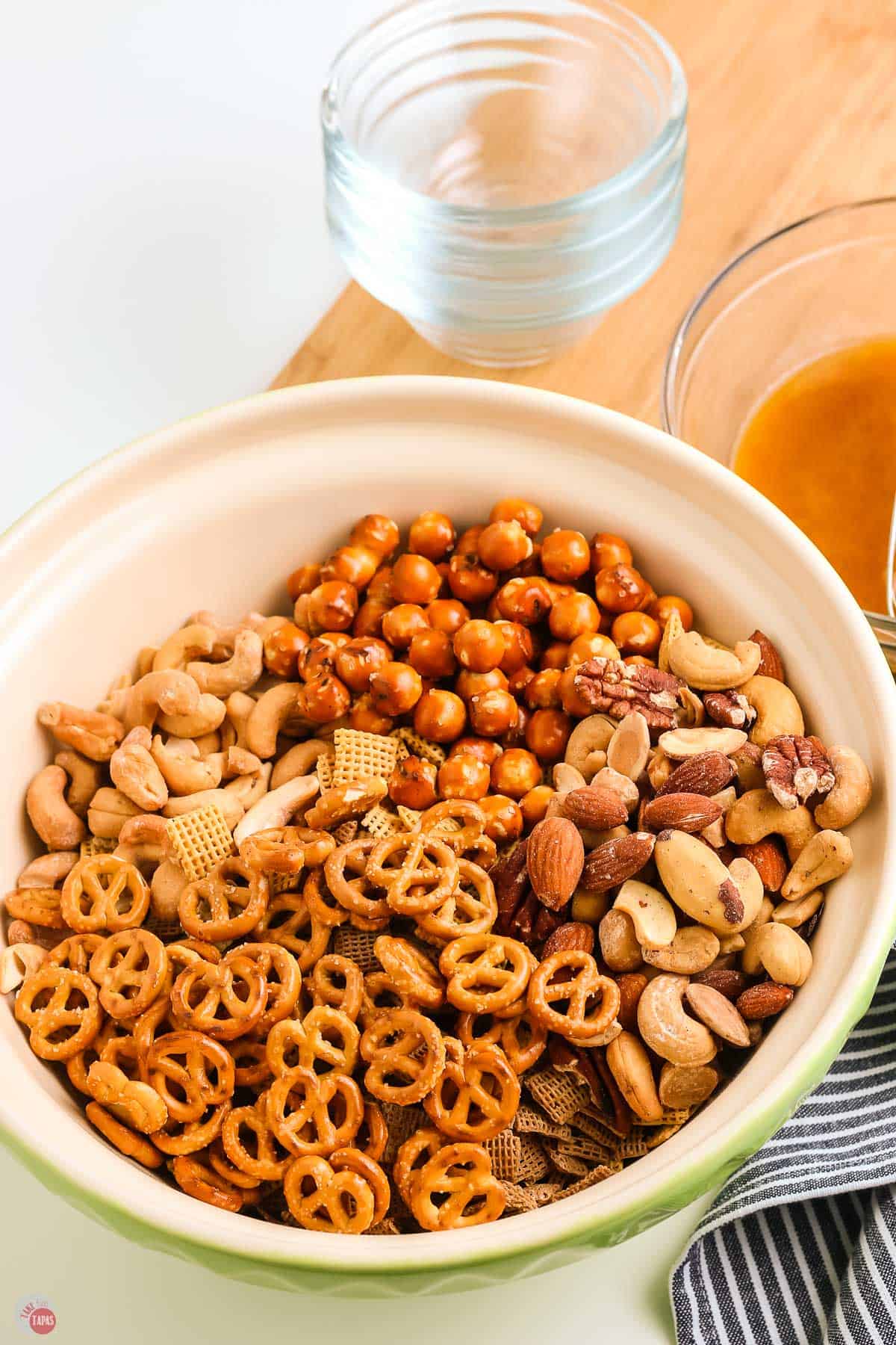 cut bagel chips and nuts in a bowl