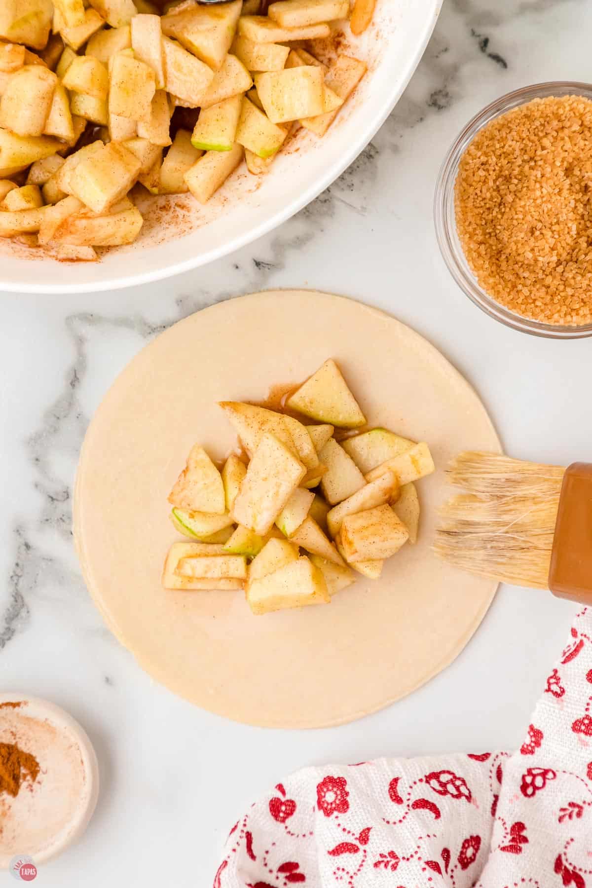 sweet caramel apple filling on dough circle