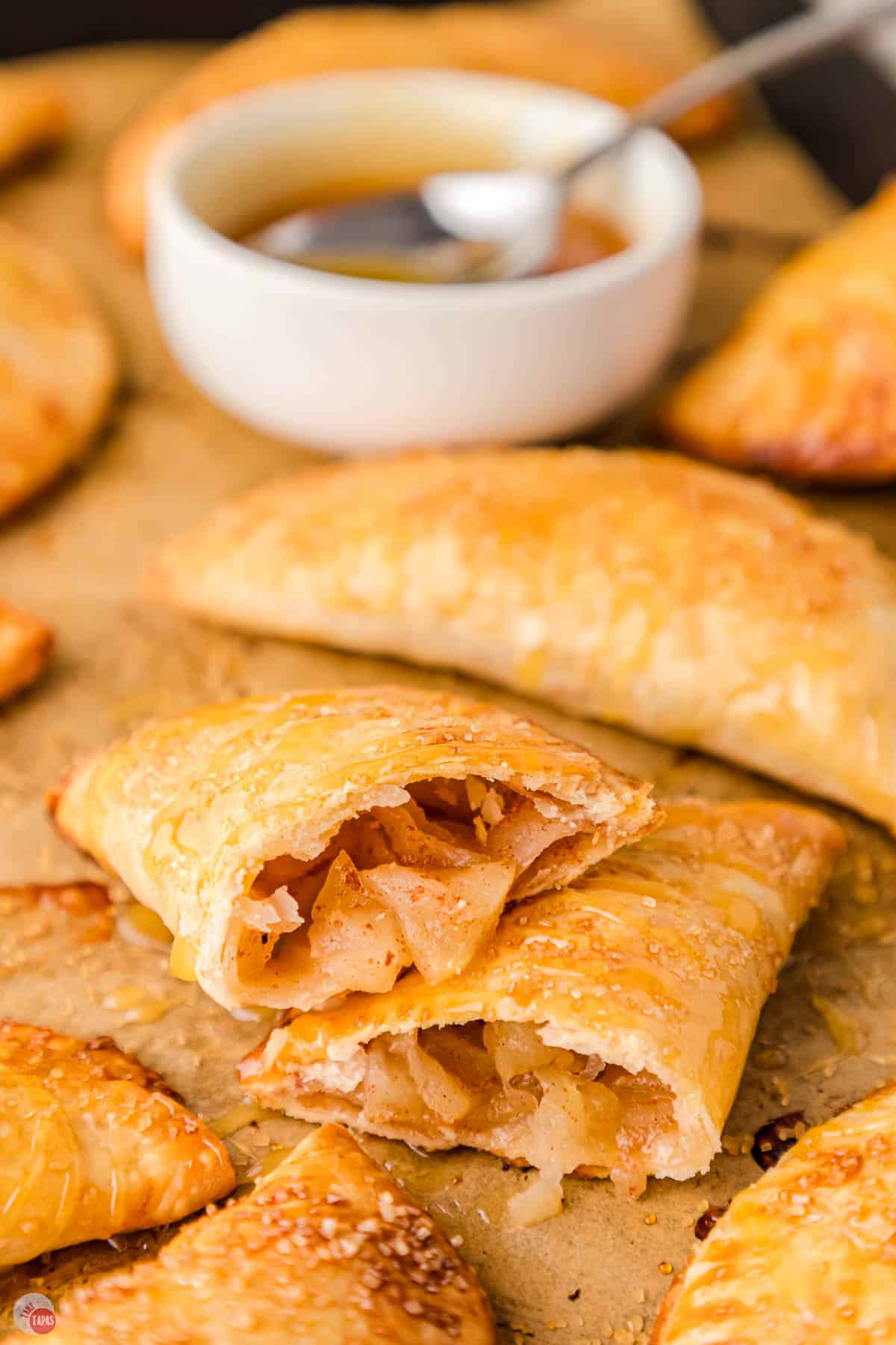 apple empanadas in half