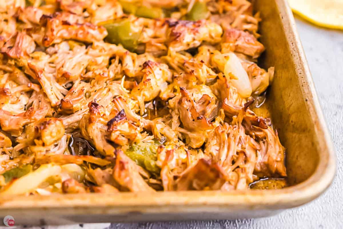 crispy shredded pork on a baking sheet