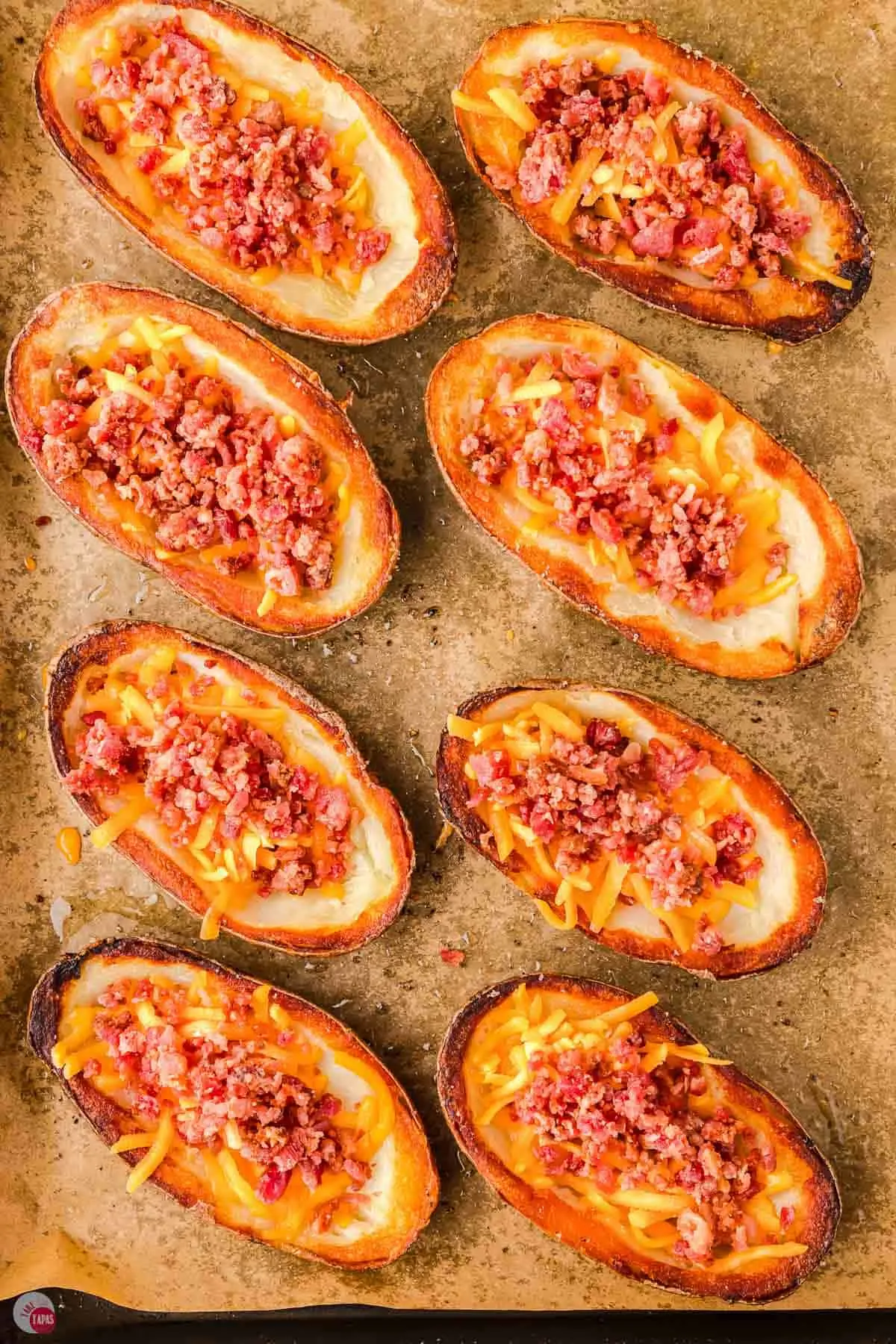 fill potato skins with cheese and bacon