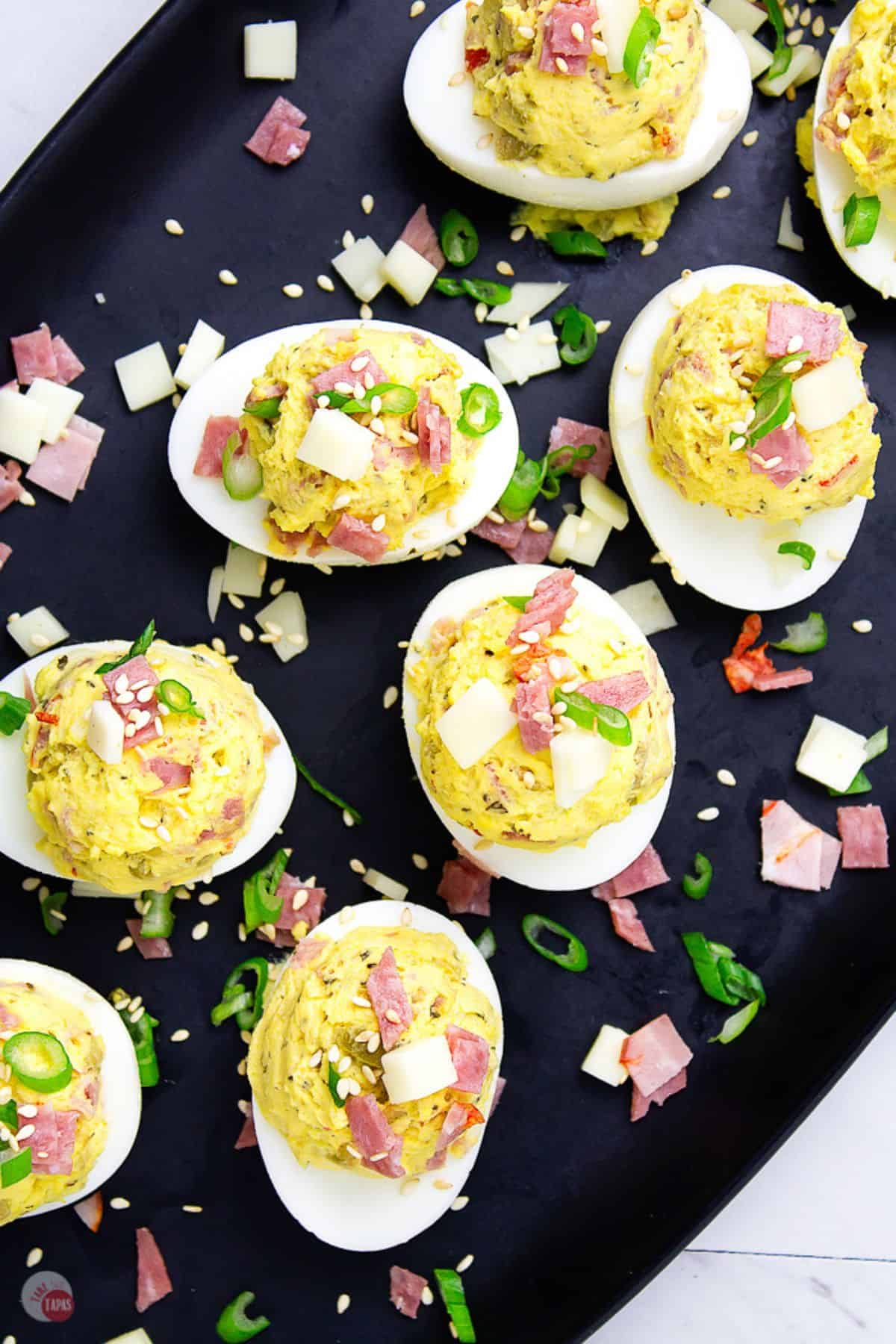 deviled eggs with muffuletta ingredients