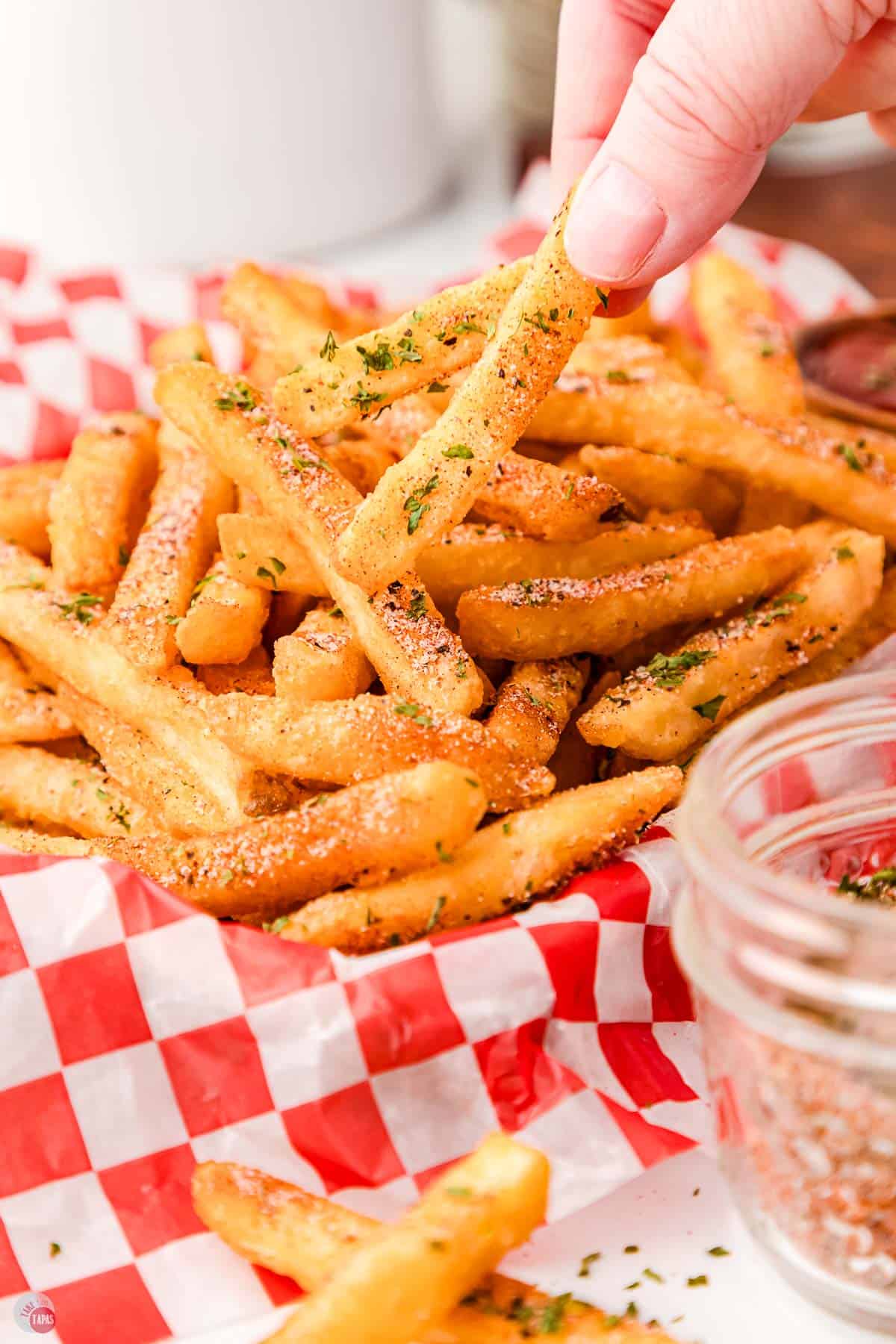this homemade fry seasoning adds flavor and a little smokiness to crispy fries