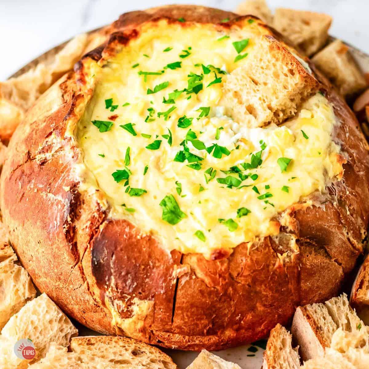 bread bowl with beer cheese dip in it featured image