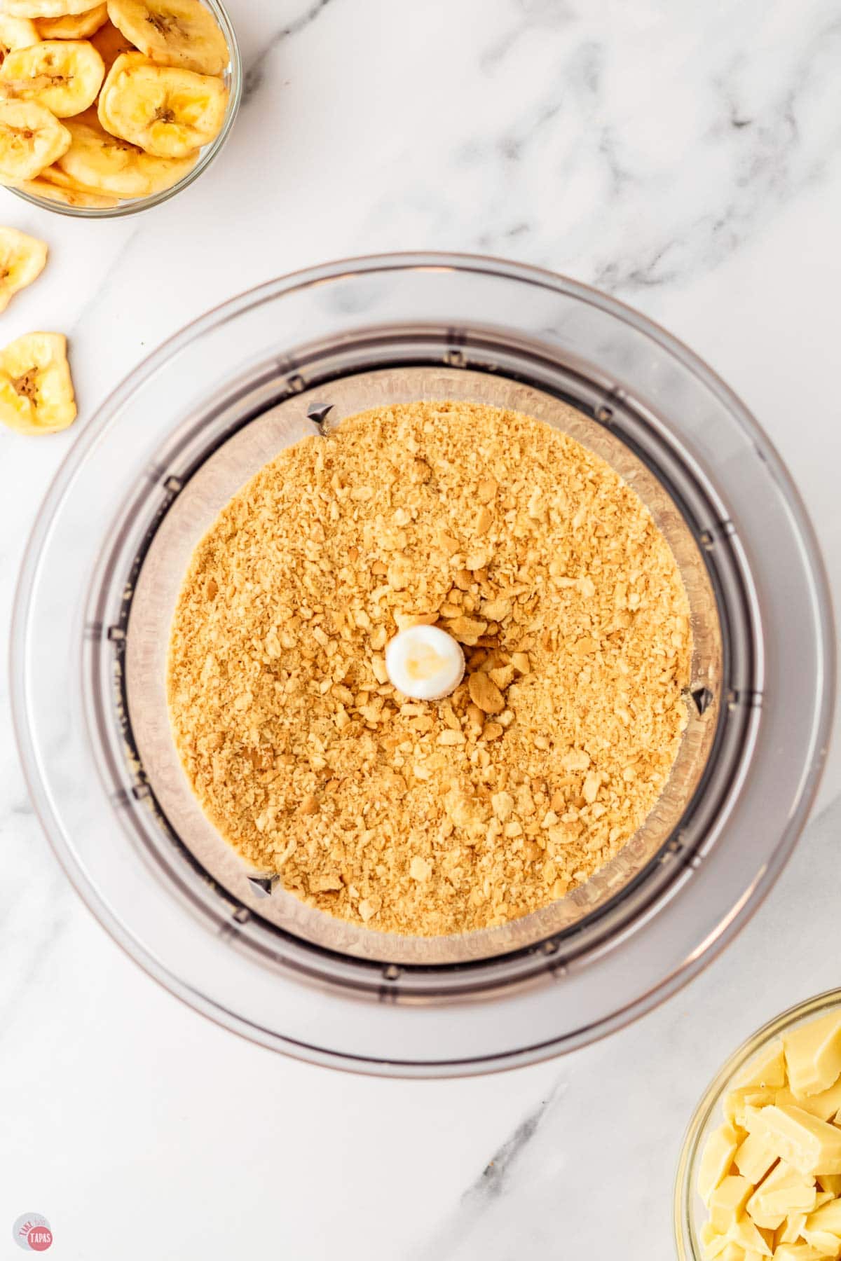 vanilla wafers pulsed into crumbs in a food processor bowl