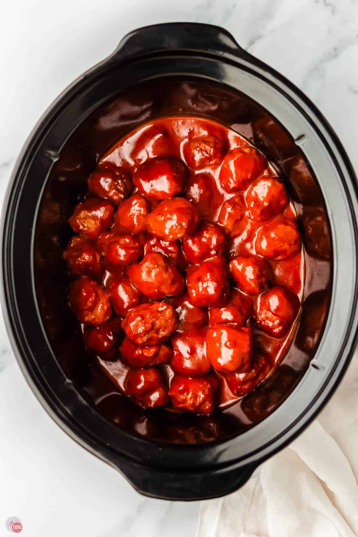 crockpot full of meatballs and sauce