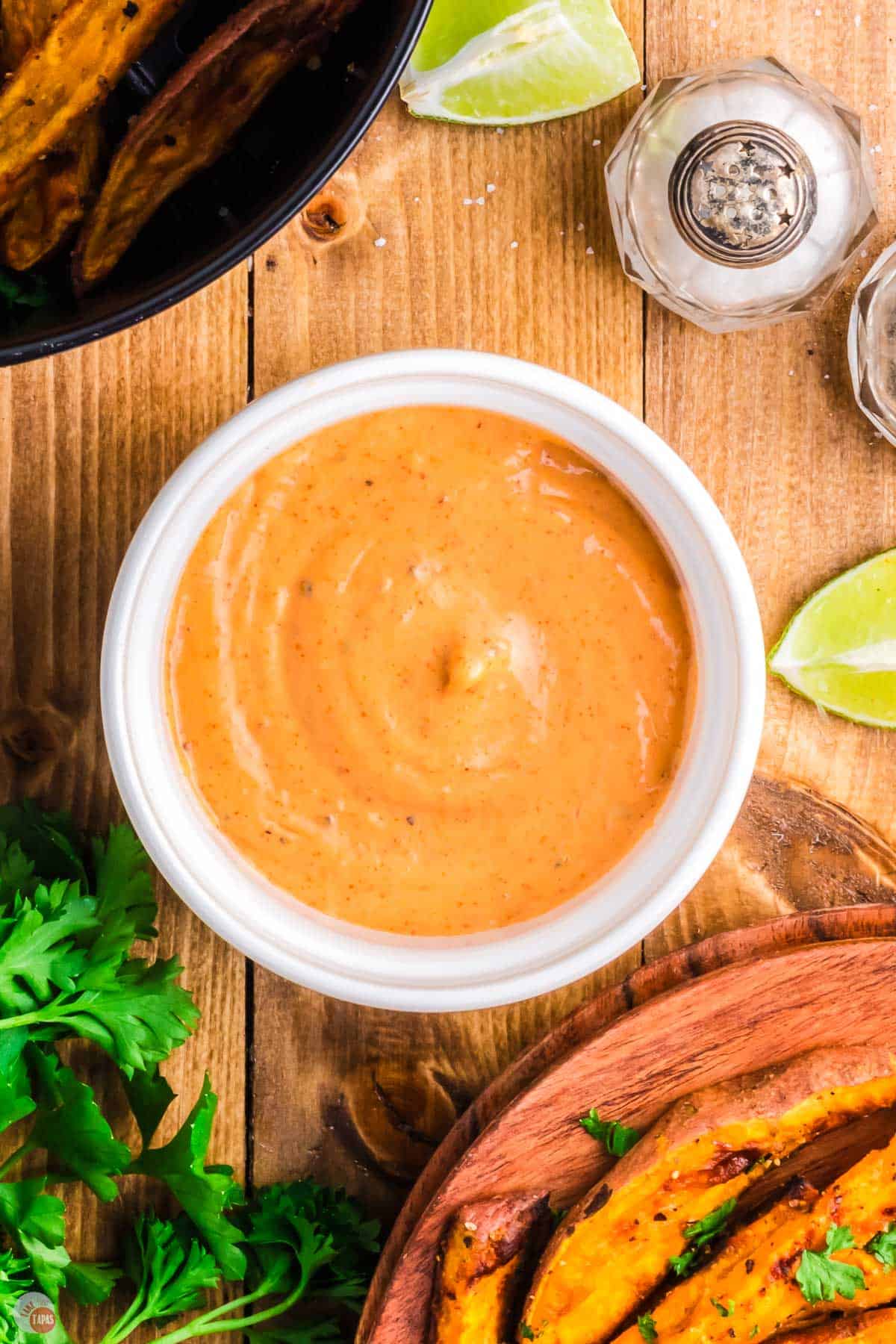 small white bowl of spicy mayo dipping sauce