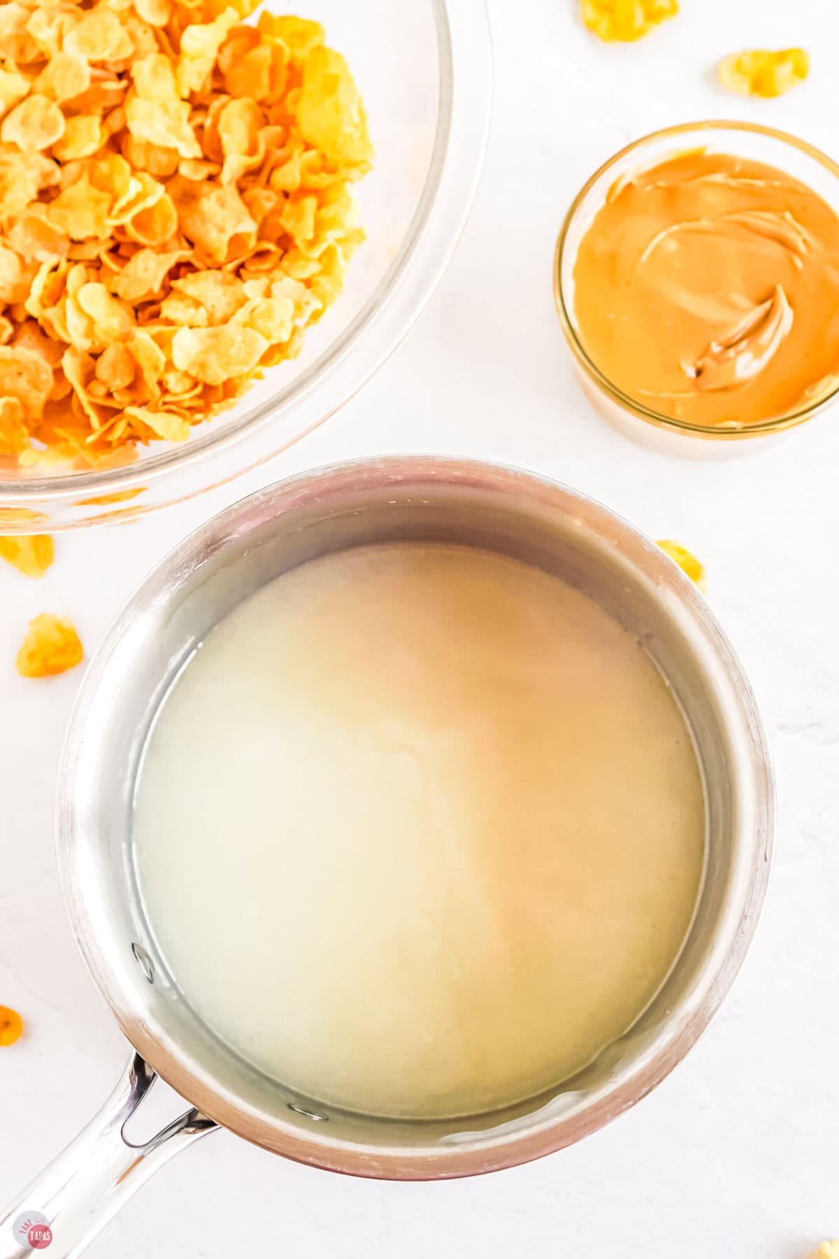 butter, sugar, and corn syrup melting in a pot