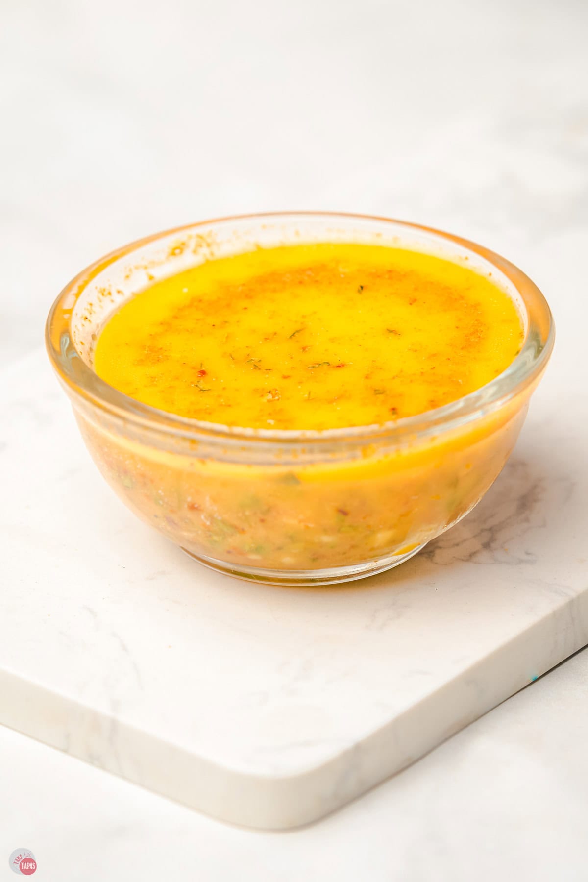 melted butter in a small clear bowl