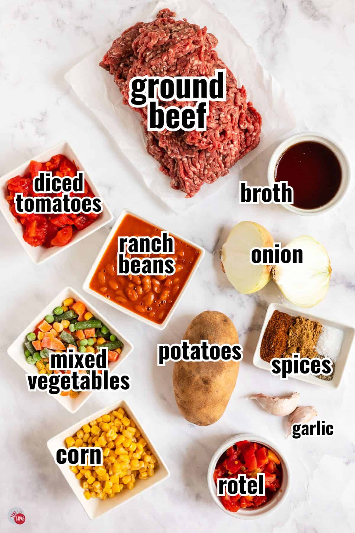 ingredients for a soup in individual bowl with text overlay labeling them