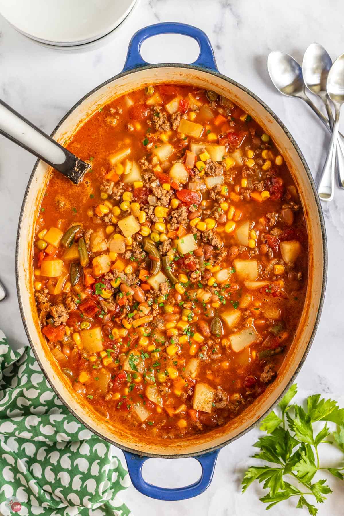 pot of cowboy soup with a ladle in it