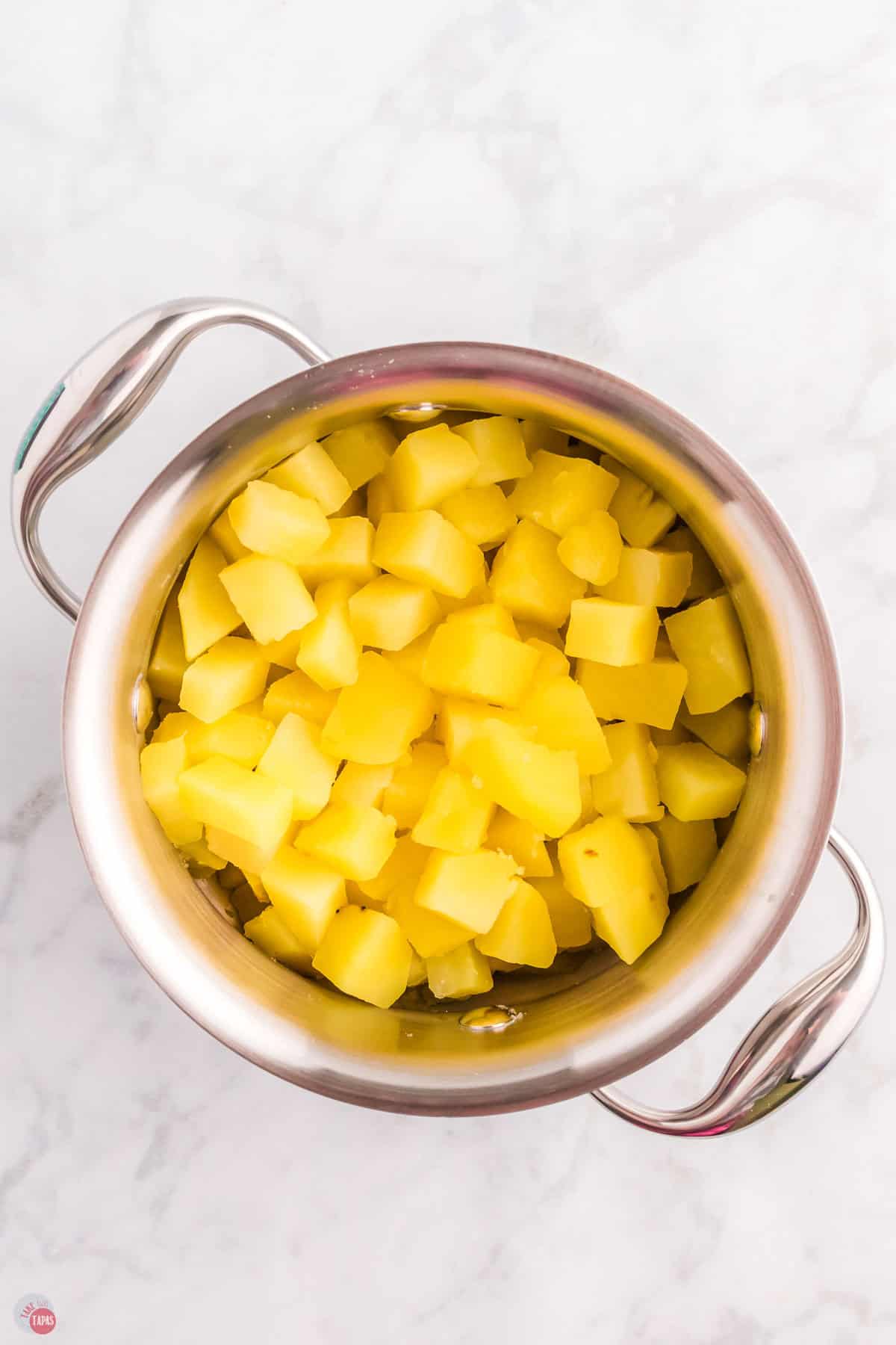 boiled potatoes in a metal pot