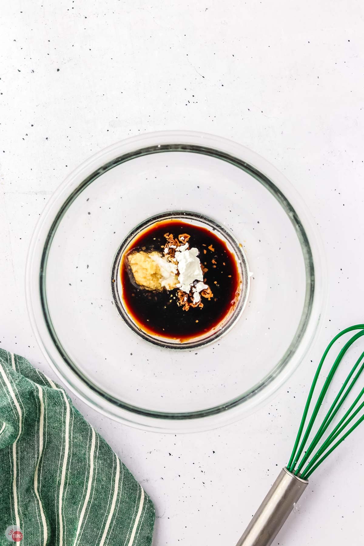 soy sauce and spices in a clear bowl