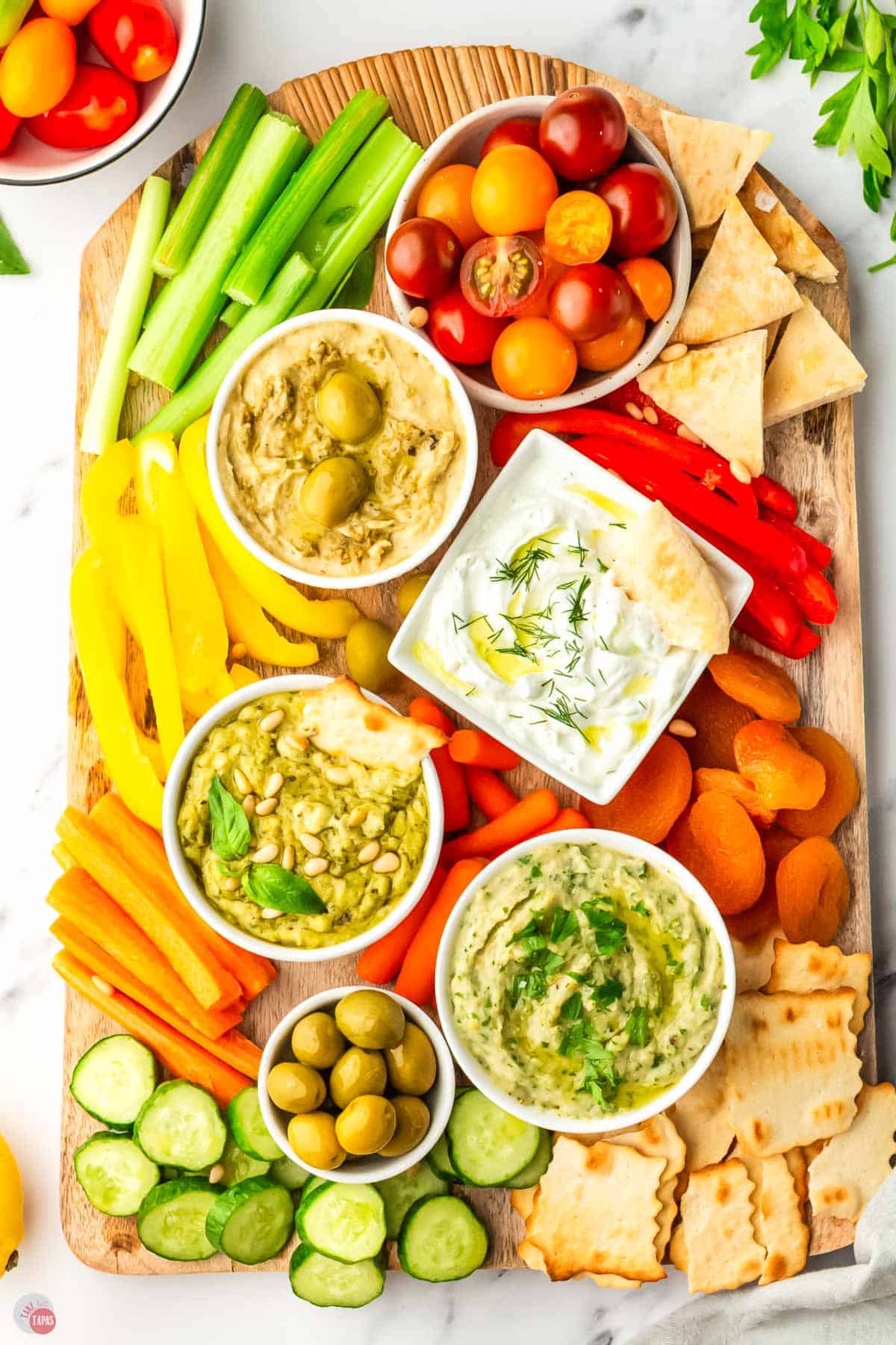 overhead picture of mezze platter with vegetables and dip