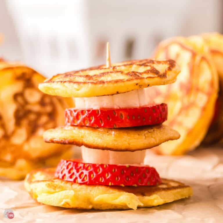 mini pancake skewers on a piece of parchment paper