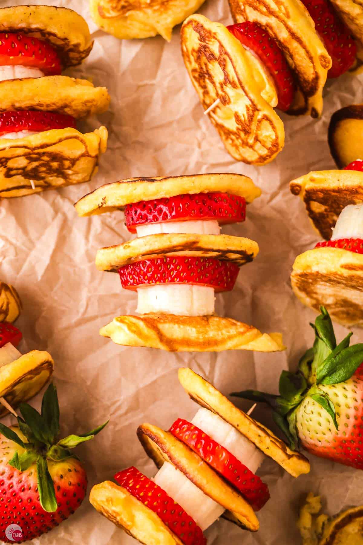 lots of pancake skewers on parchment paper