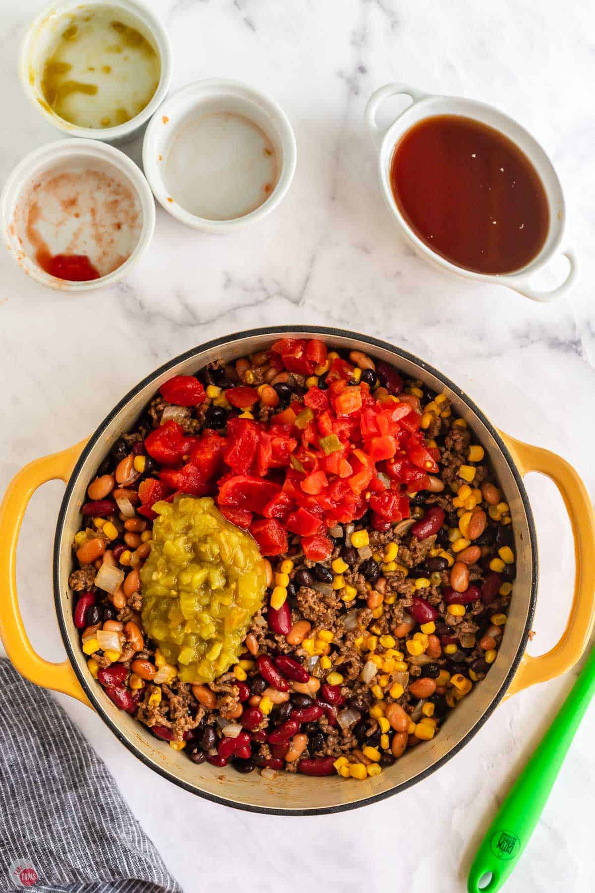 diced tomatoes and green chiles in a yellow pot