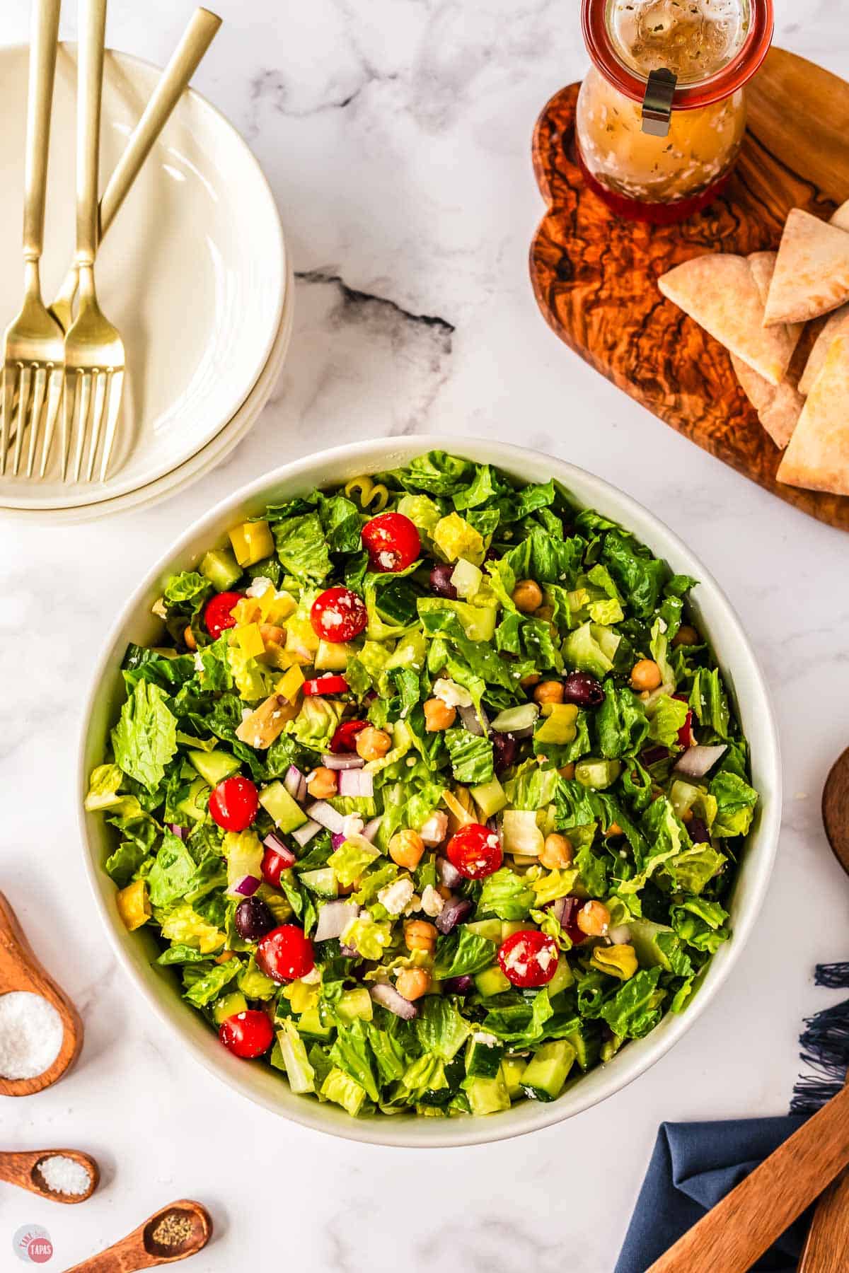 overhead picture of greek chopped salad in a bowl