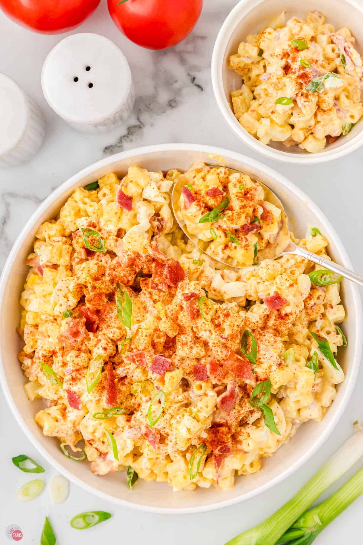 overhead picture of bowl of pasta salad with eggs and bacon