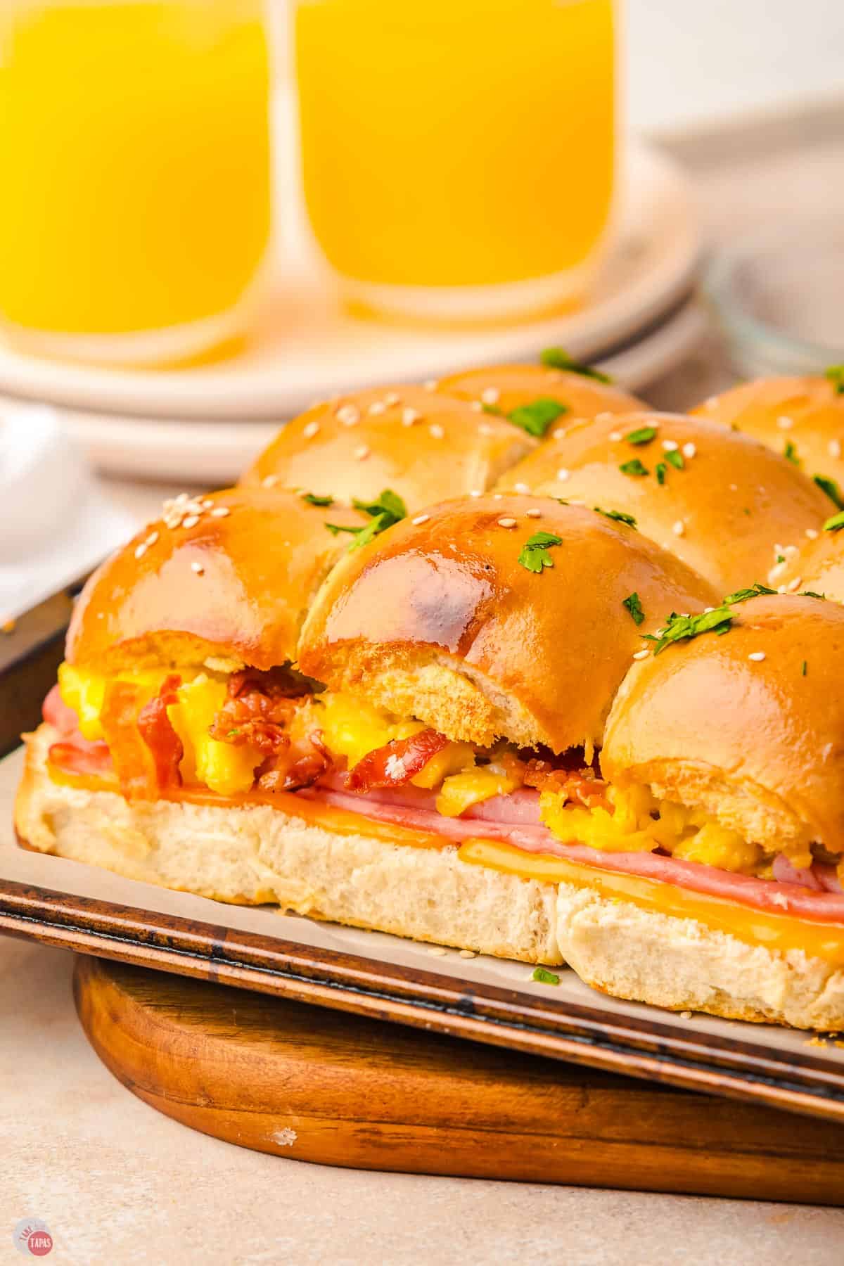 baking sheet with breakfast sliders on it