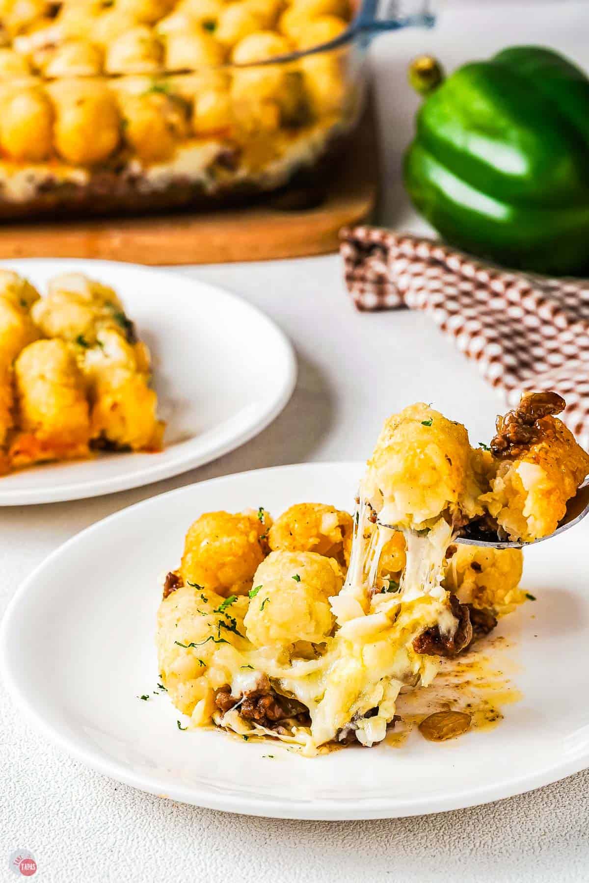 fork with bite of philly cheesesteak casserole