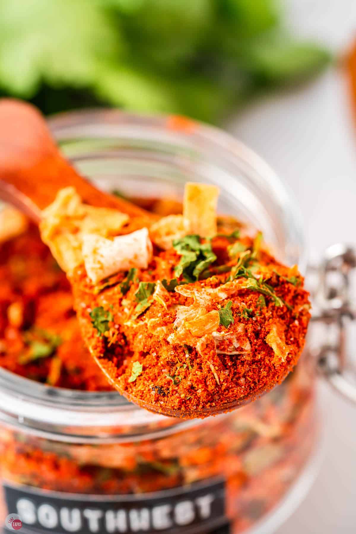 wood spoon with mixed spices on it