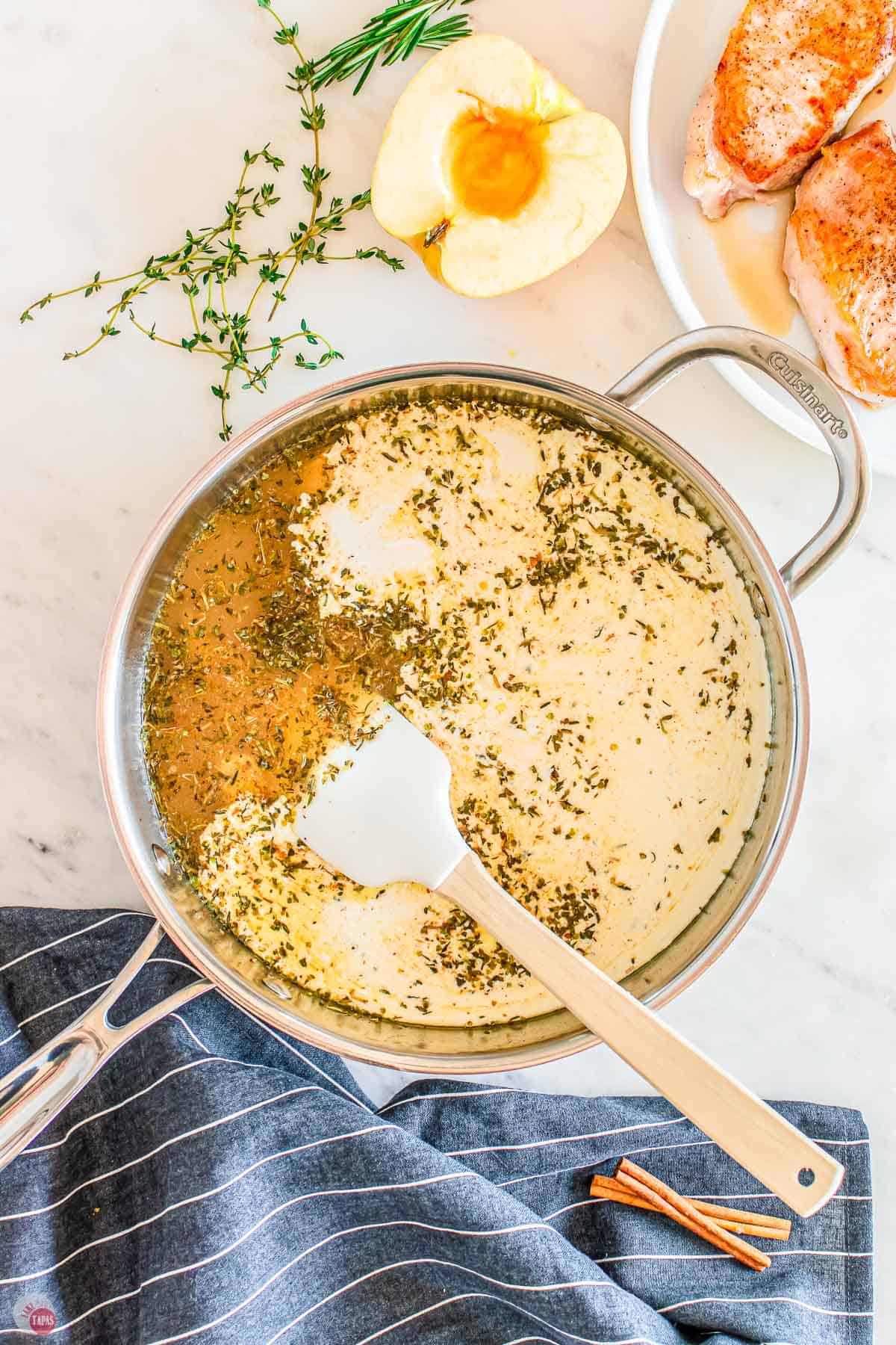 cream and broth in a skillet