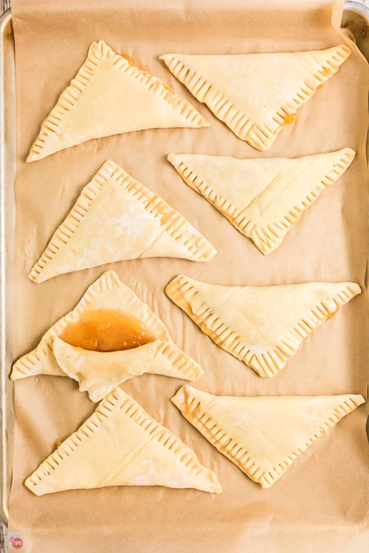 pastry triangles on brown parchment paper
