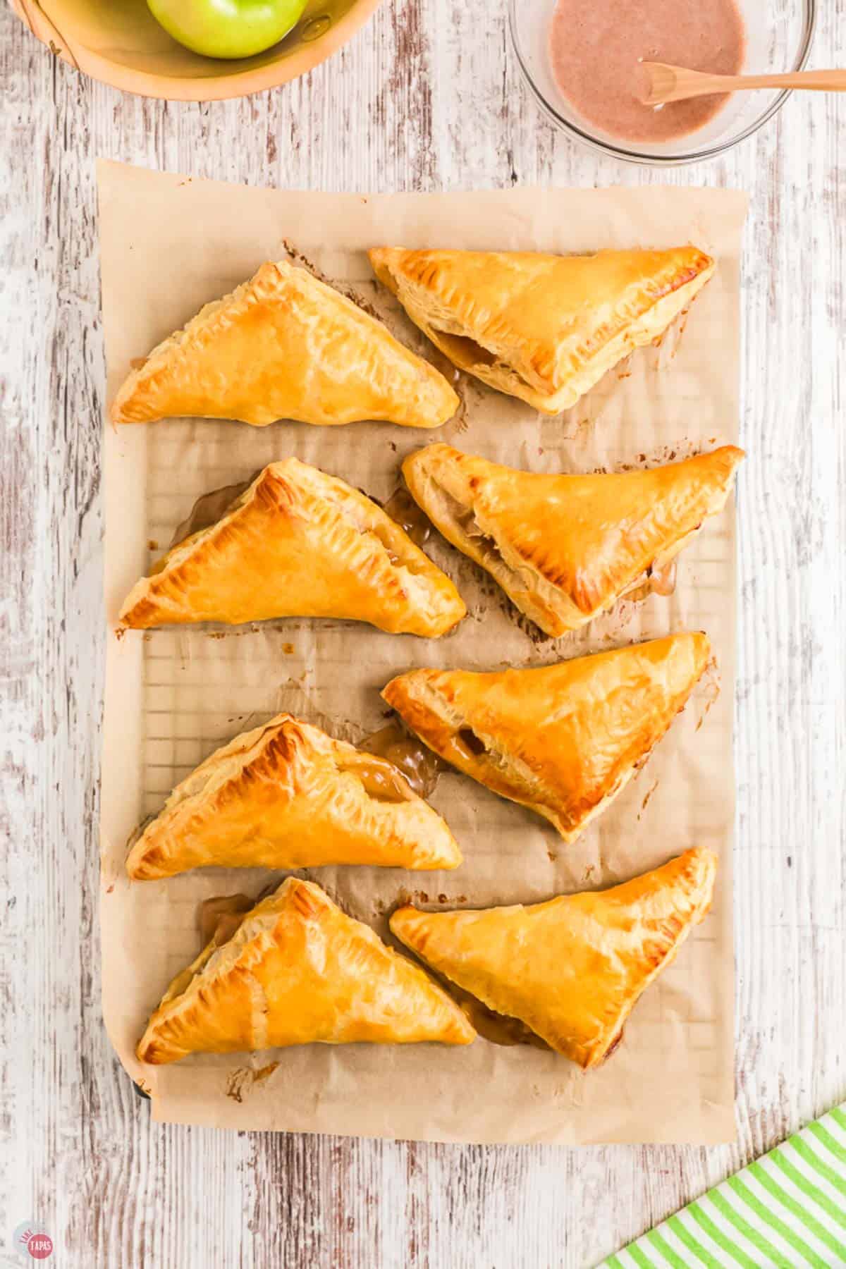 baked apple turnovers on a cooling rack