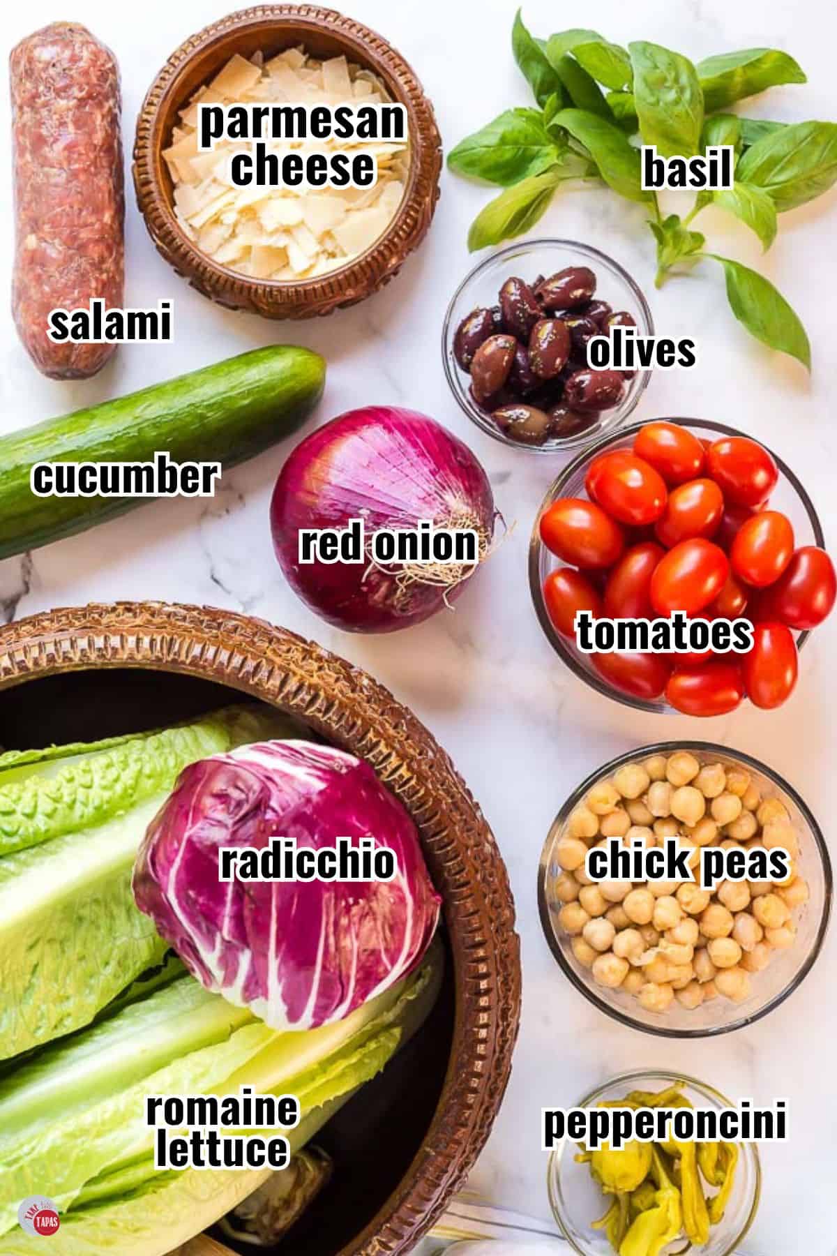 individual ingredients for a salad recipe with text overlay labeling them