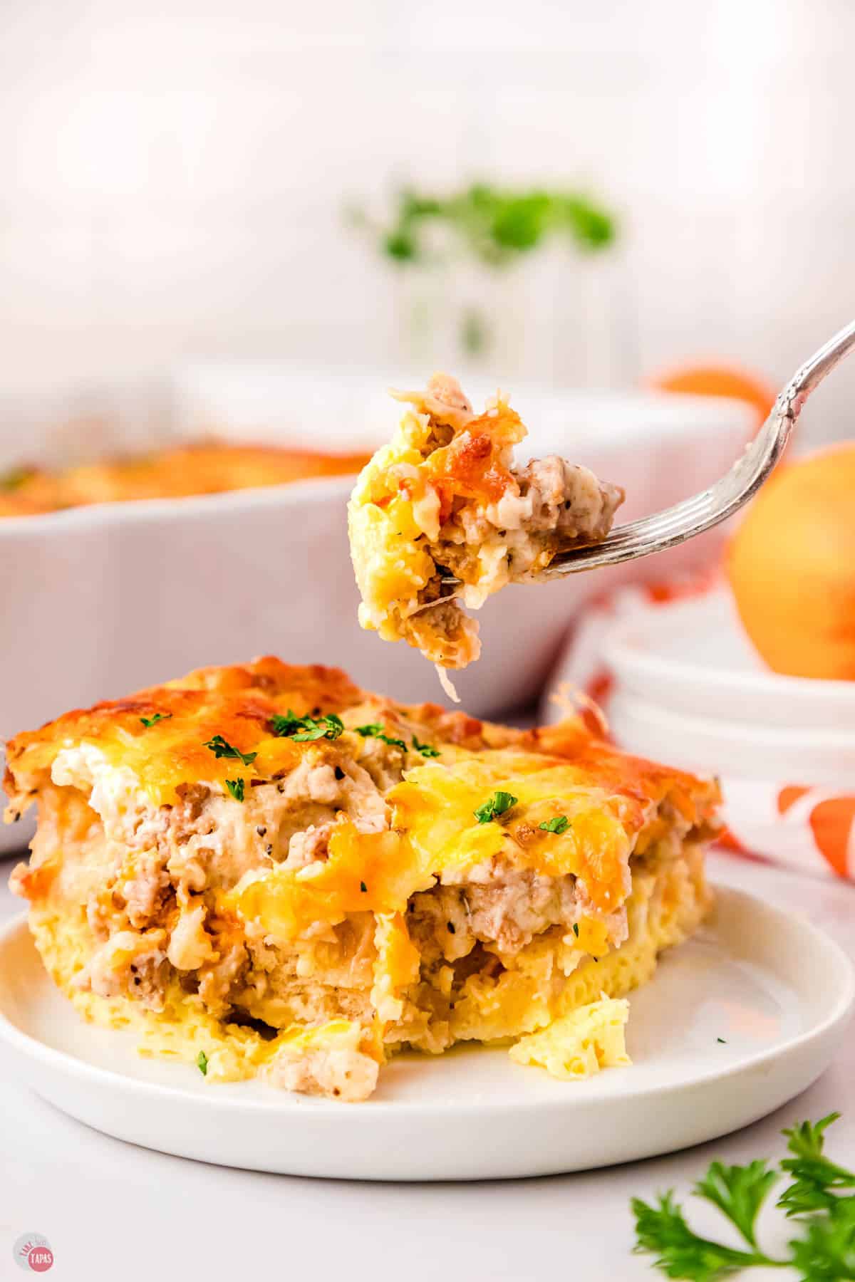fork with a bite of casserole on it