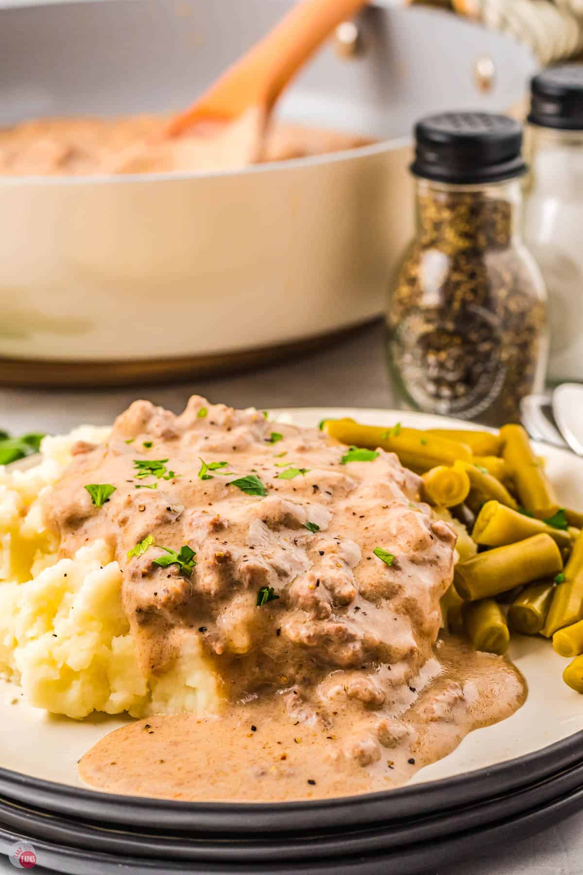 plate of hamburger gravy with mashed potatoes