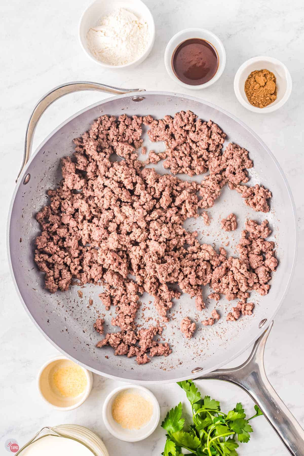 coked ground beef in a skillet