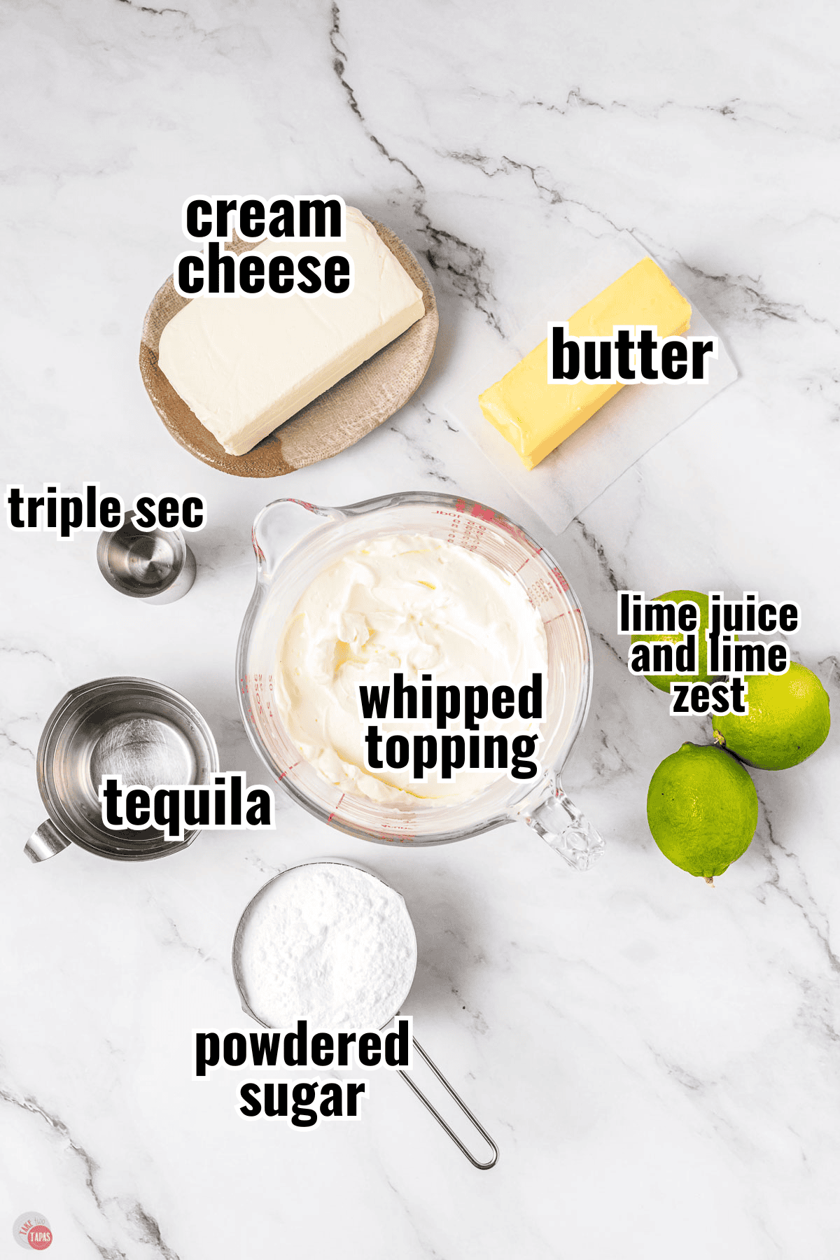 ingredients for a dip recipe in individual bowls with text overlay labeling them