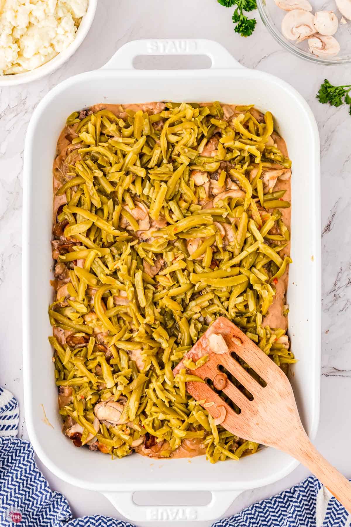 casserole with green beans on top