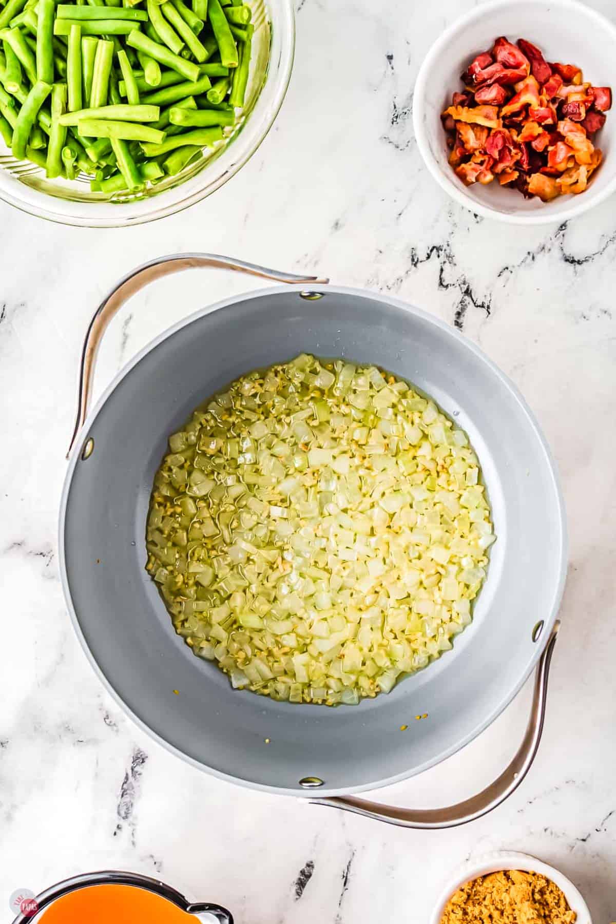 onions cooking in a skillet