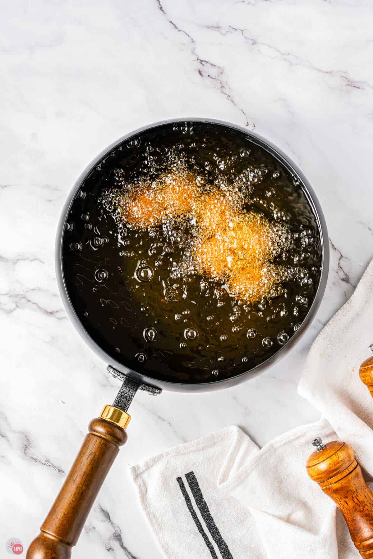 stuffing balls frying in a pan
