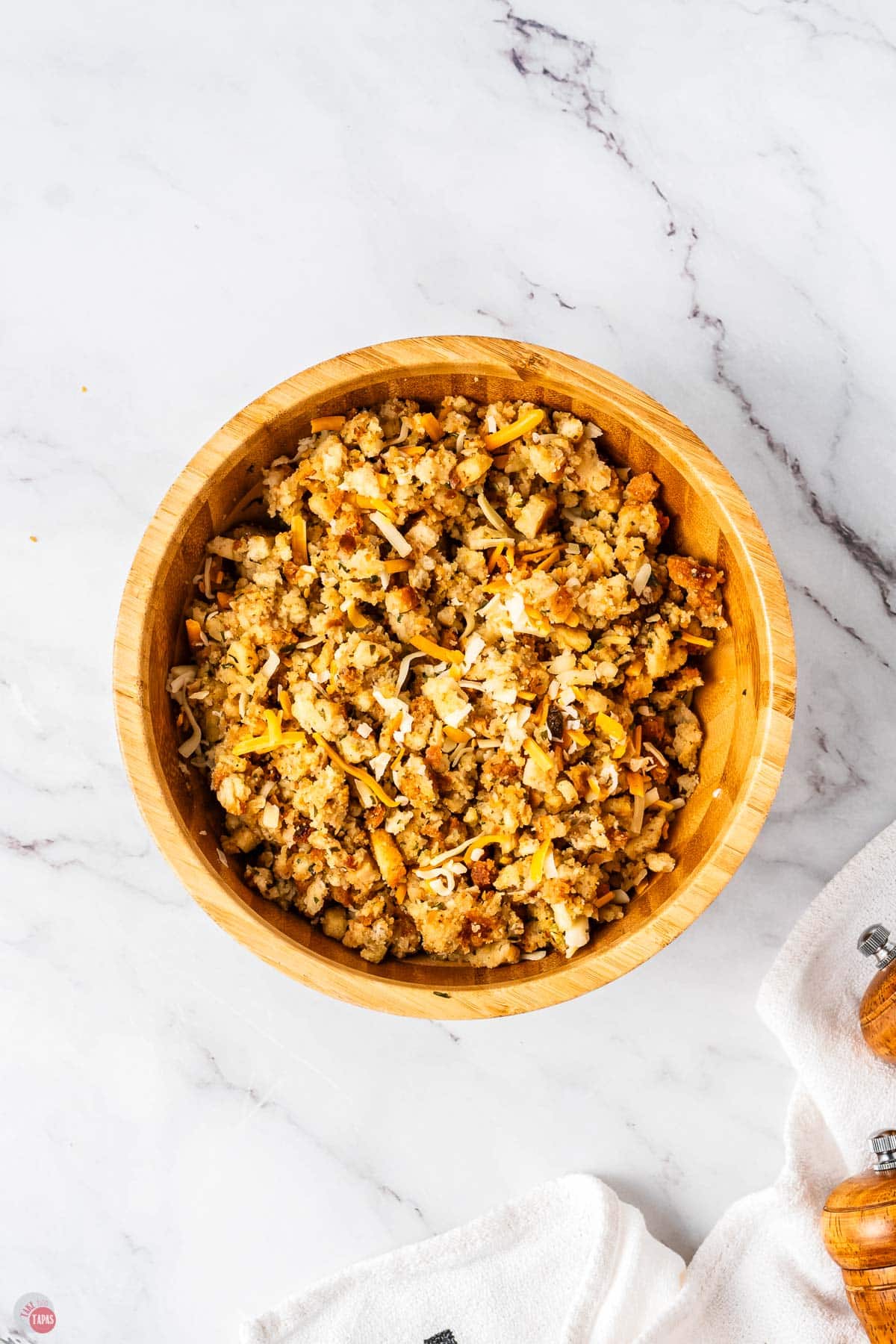 bowl of stuffing and shredded cheese