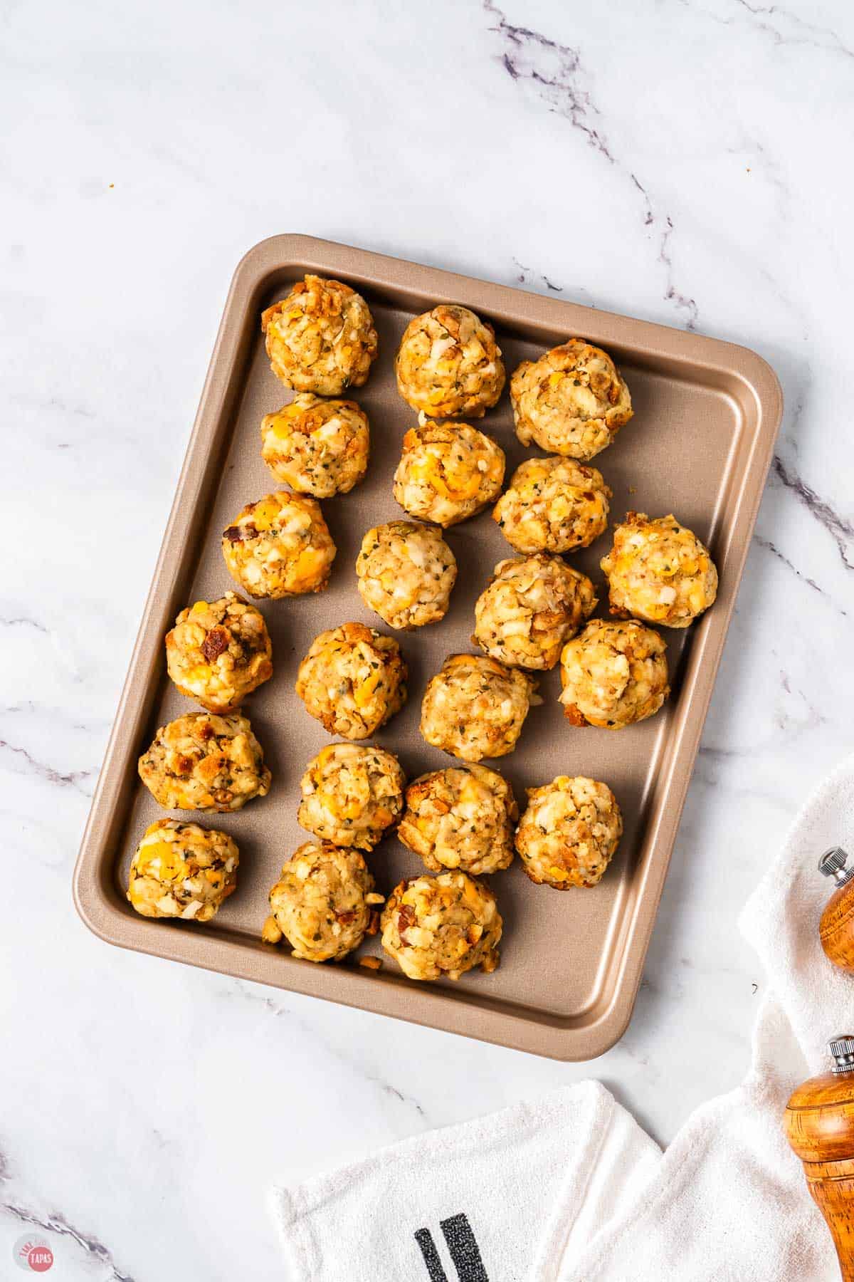 sheet pan with stuffing balls on it