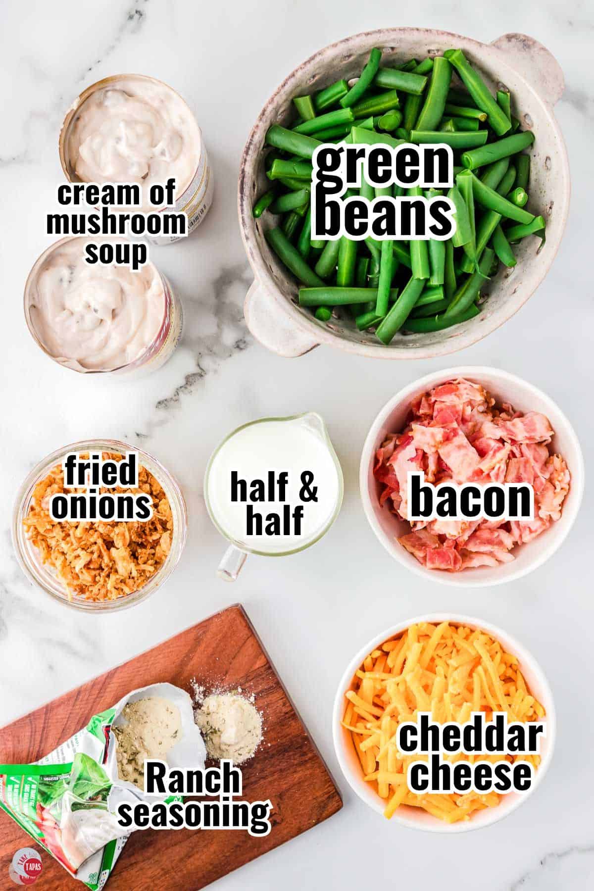 ingredients for casserole recipe in individual bowls with text overlay labeling them