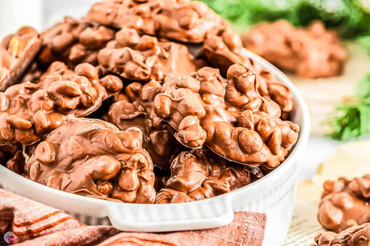 bowl of peanut clusters on a napkin