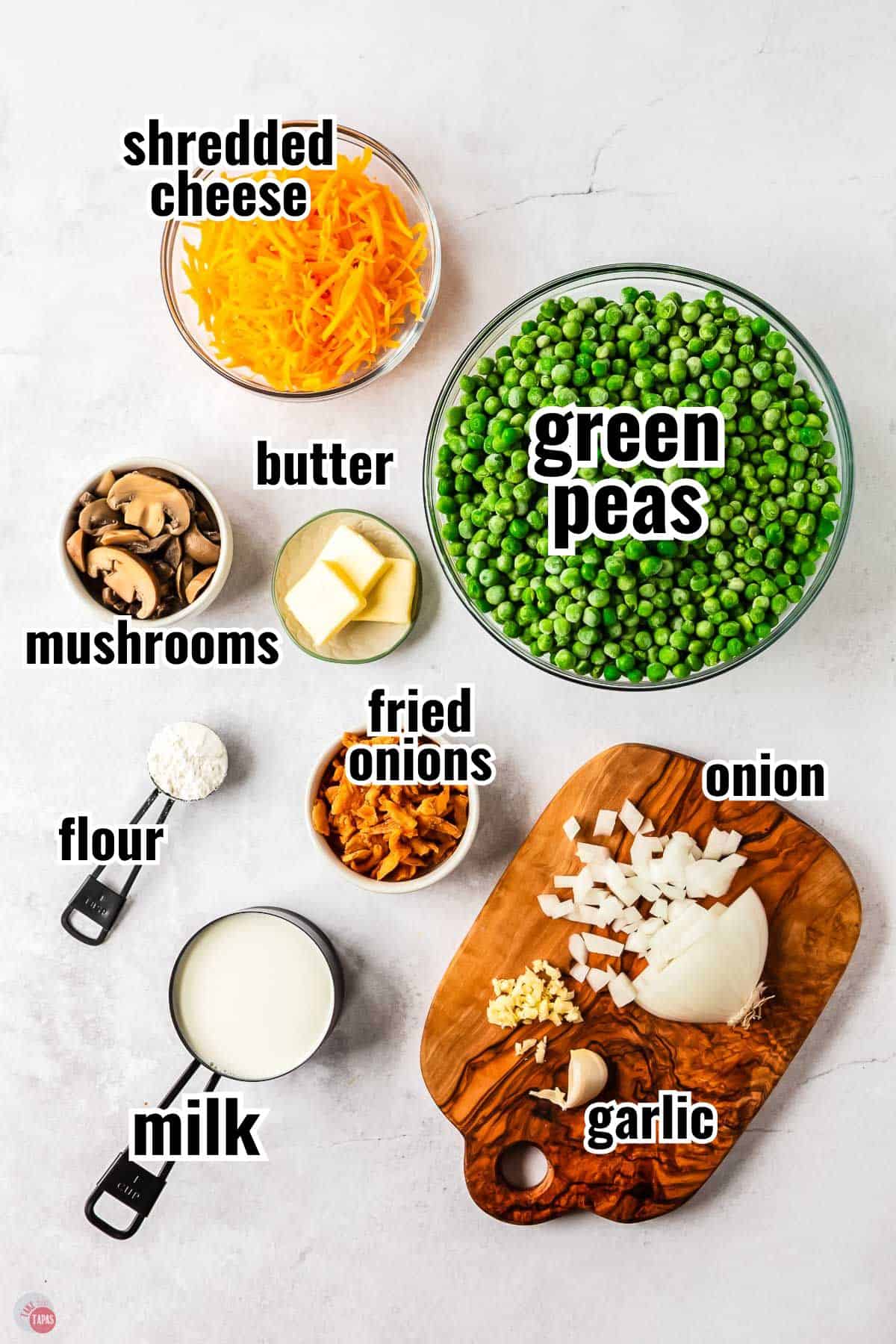 ingredients for a casserole in individual bowls with text overlay labeling them