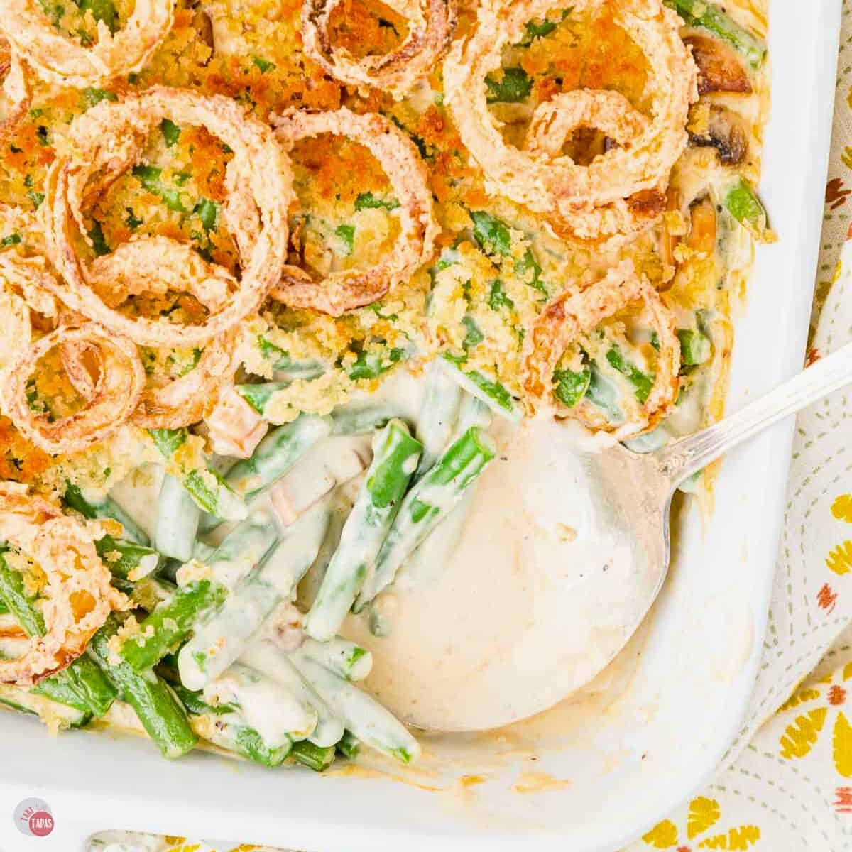 copycat Joanna Gaines green bean casserole in a white baking dish