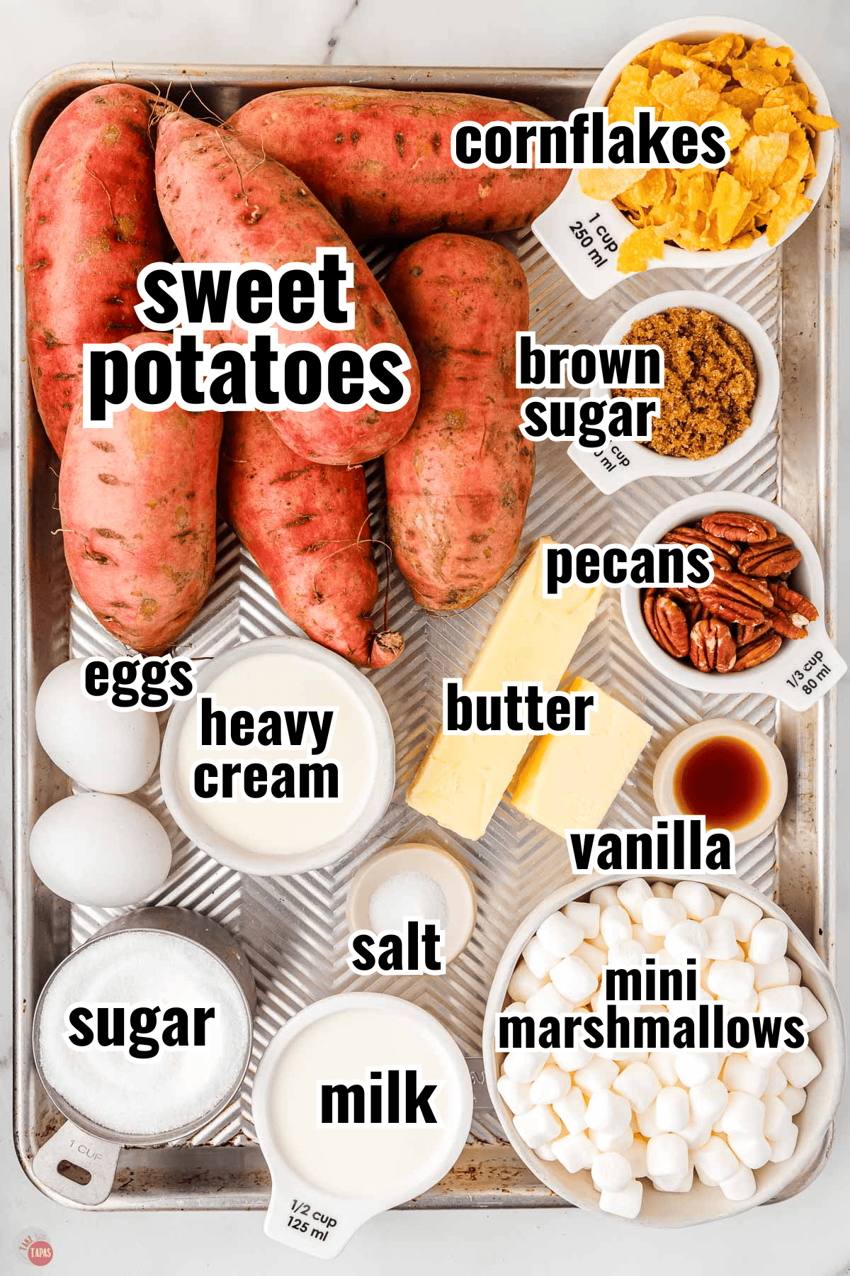 ingredients for a sweet potato casserole in individual bowls with text overlay labeling them