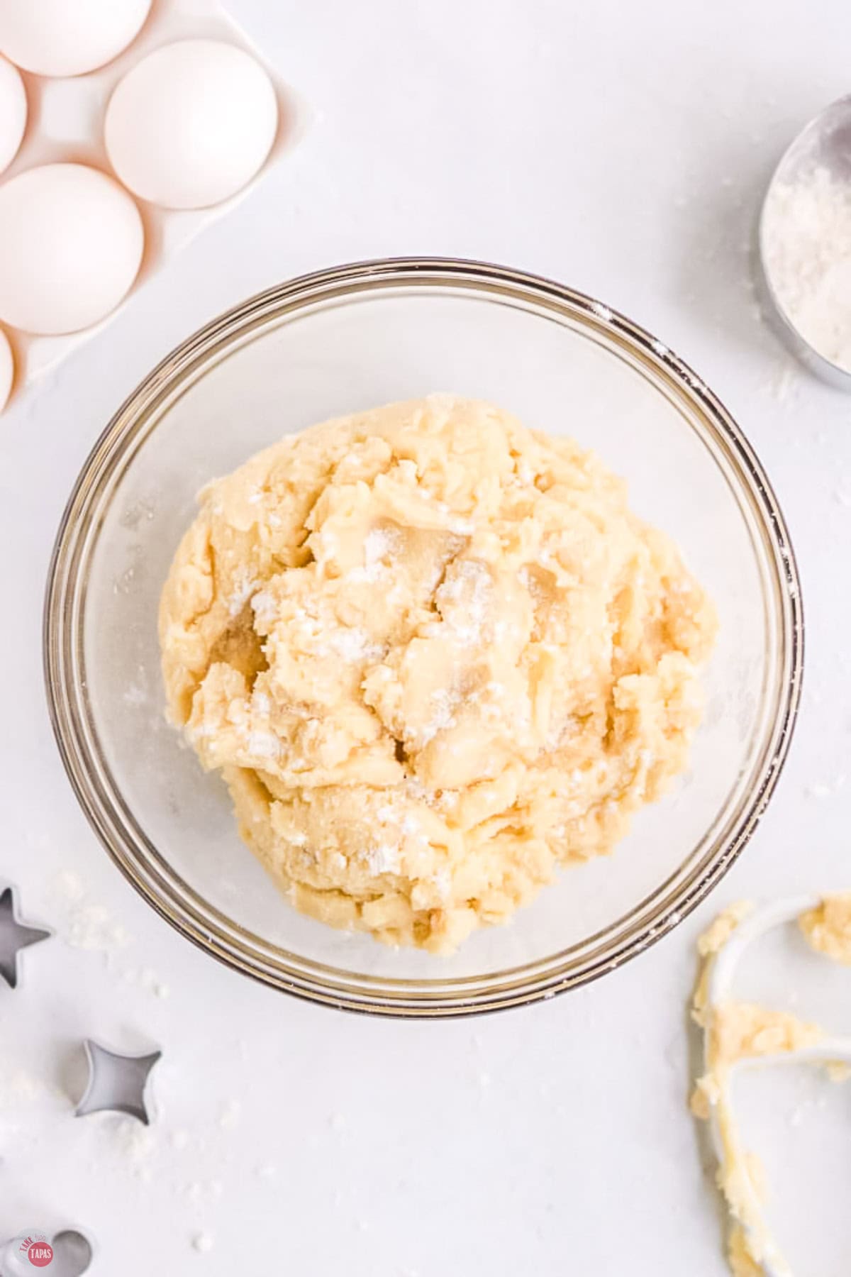 sugar cookie dough in a clear bowl