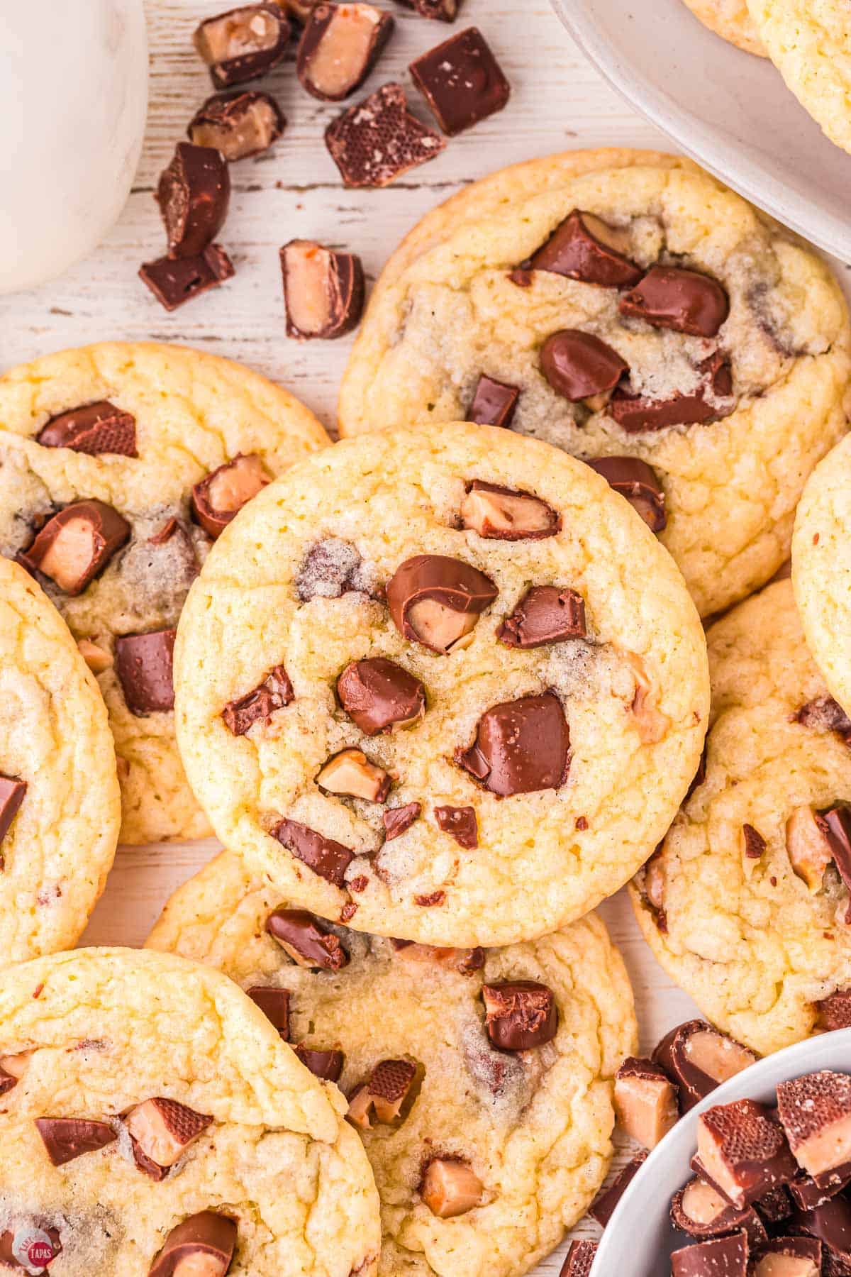 overhead picture of plate of cookies with chocolate and toffee bits