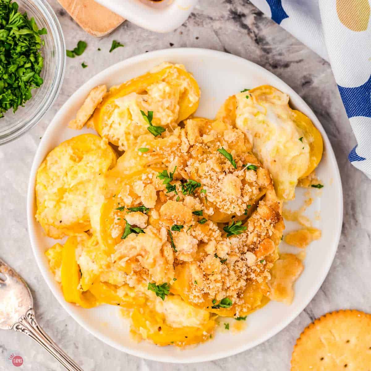 trisha yearwood's squash casserole recipe on a white plate